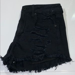 Black ripped jean shorts